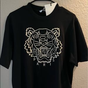 Size small, loose fitted t shirt, logo embroidered